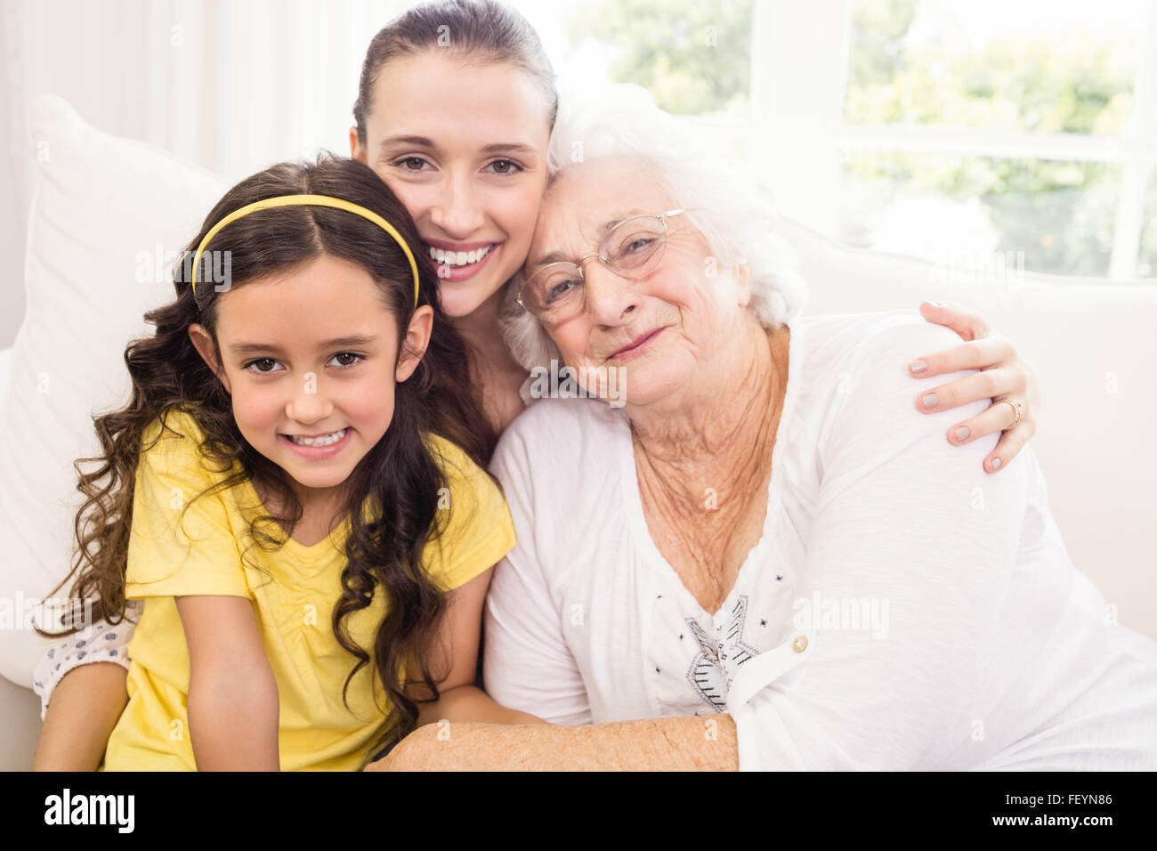 Happy extended family smiling Stock Photo