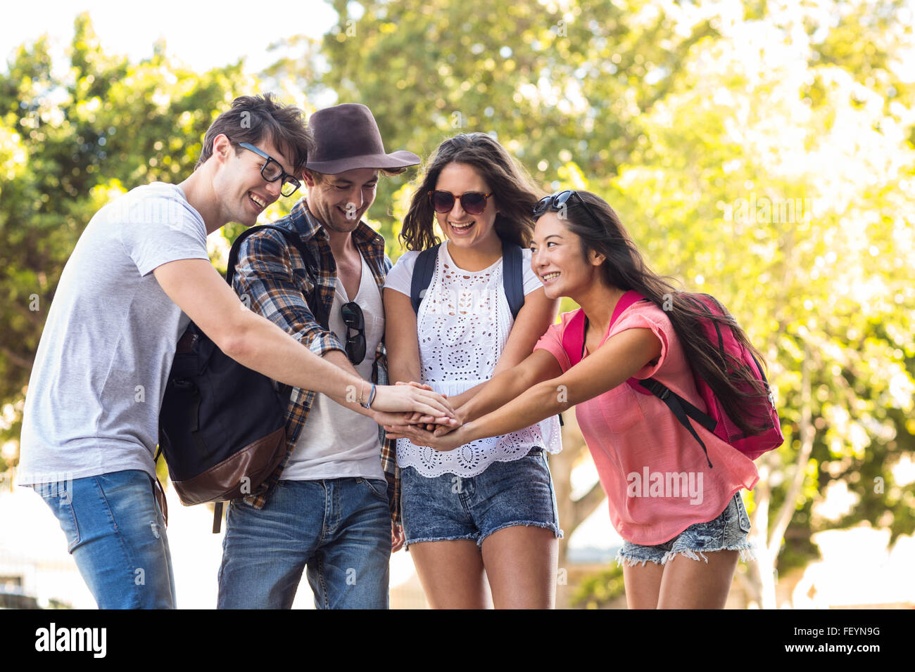 Hip friends cheering up Stock Photo