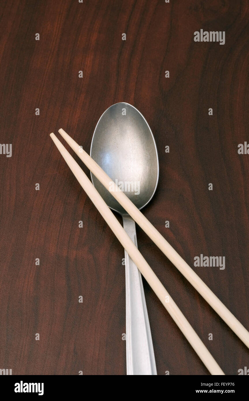 chopsticks and spoon Stock Photo Alamy