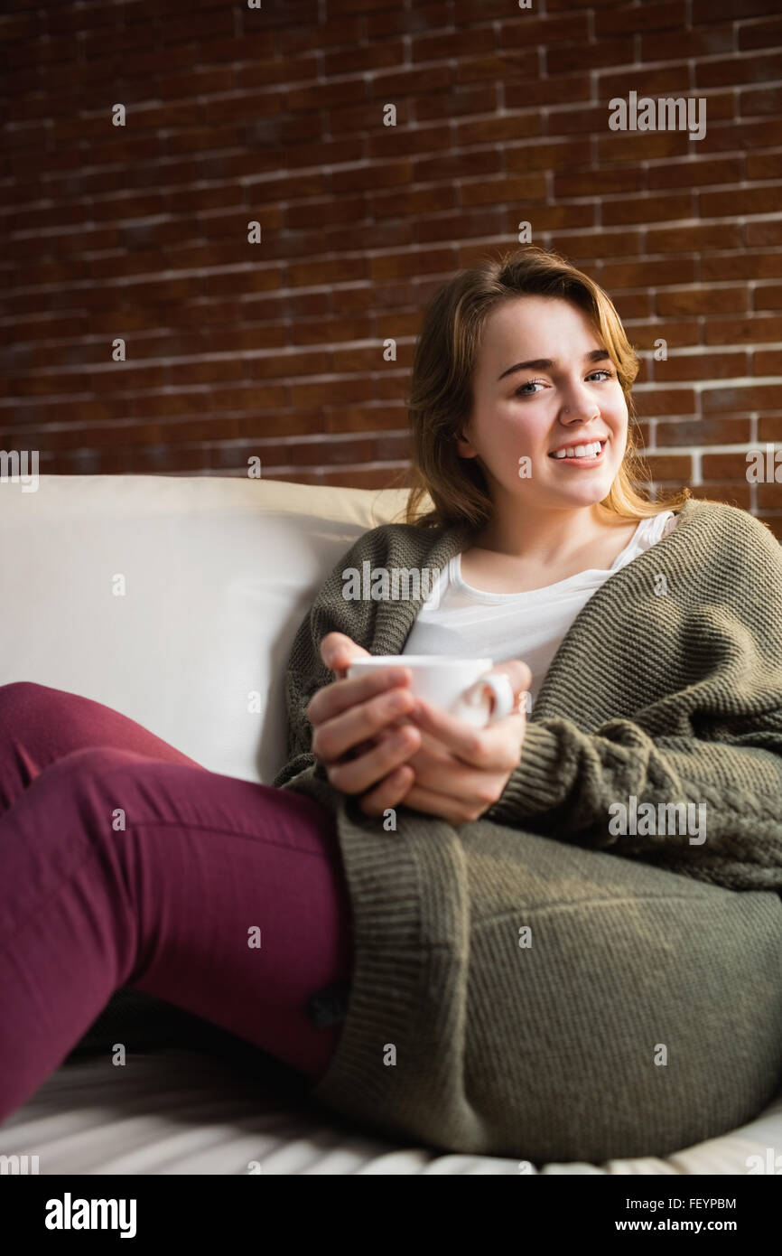 Pretty woman drinking coffee Stock Photo