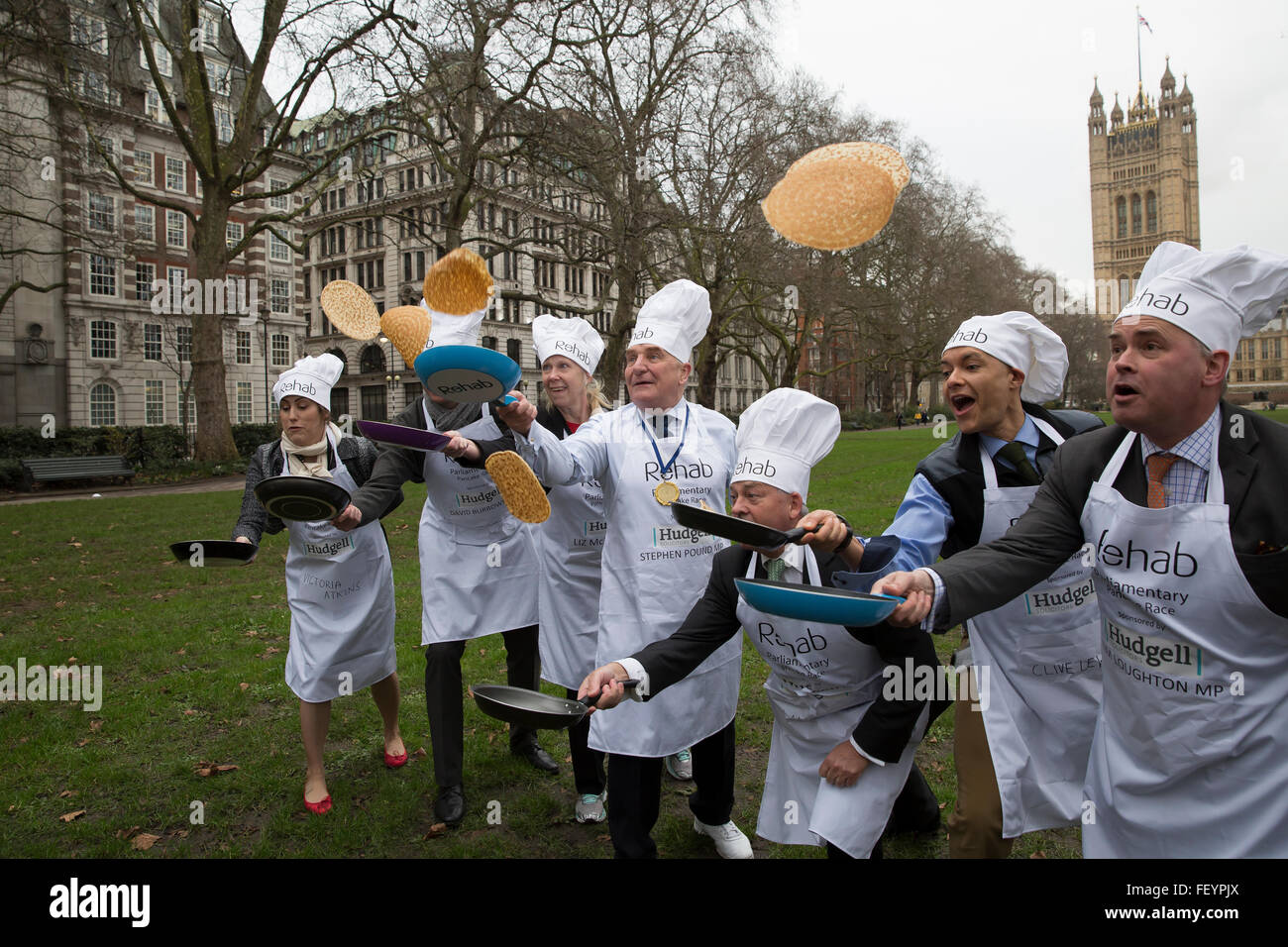 Westminster,UK, 9th February 2016, MP's win the Rehab annual pancake race and pose for photos while tossing pancakes Credit: Keith Larby/Alamy Live News Stock Photo