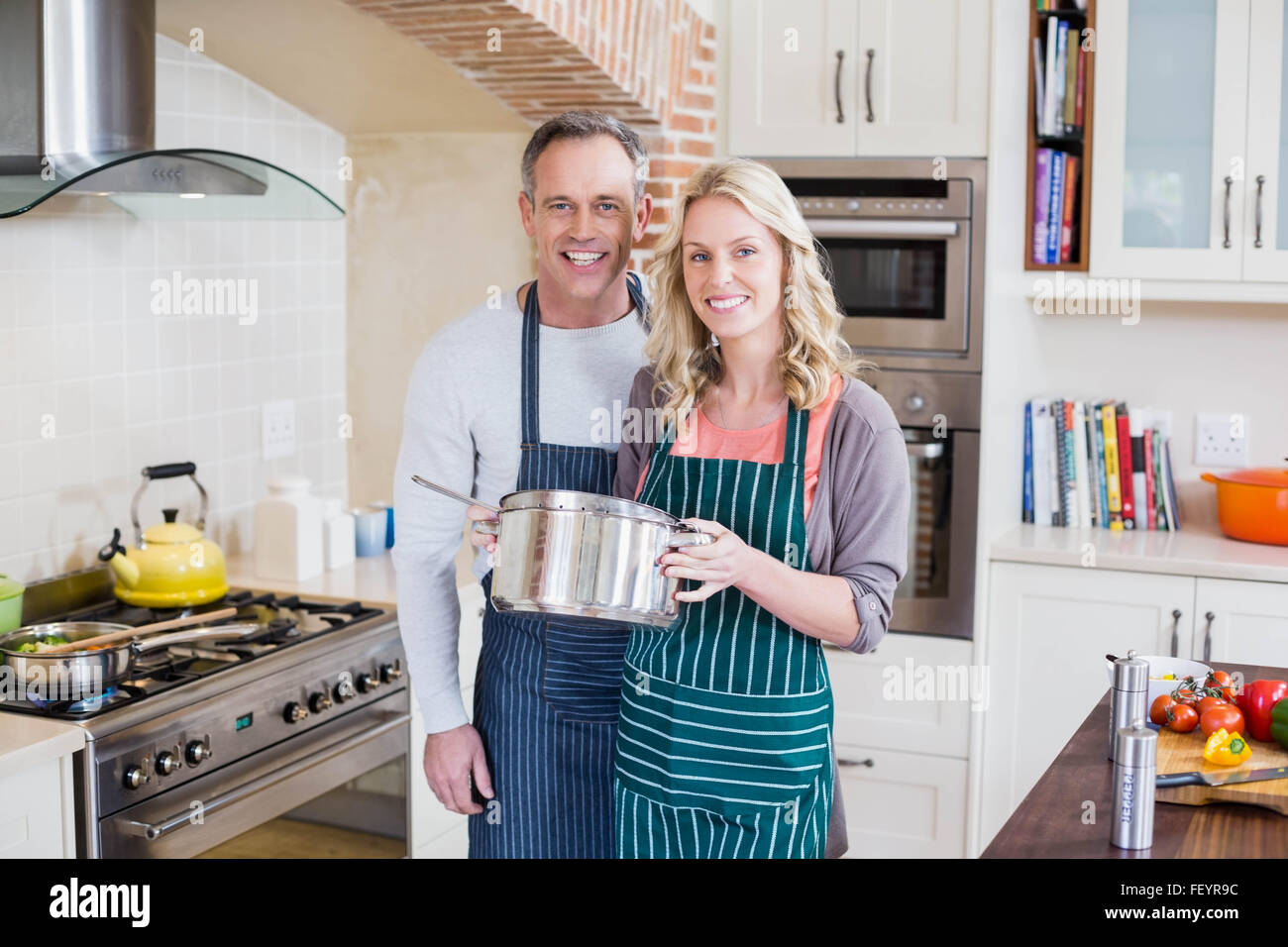 Cute couple cooking Stock Photo