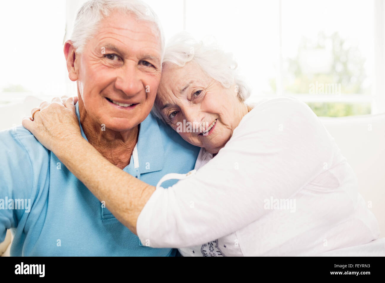 Cute Senior Couple Hugging Stock Photo Alamy