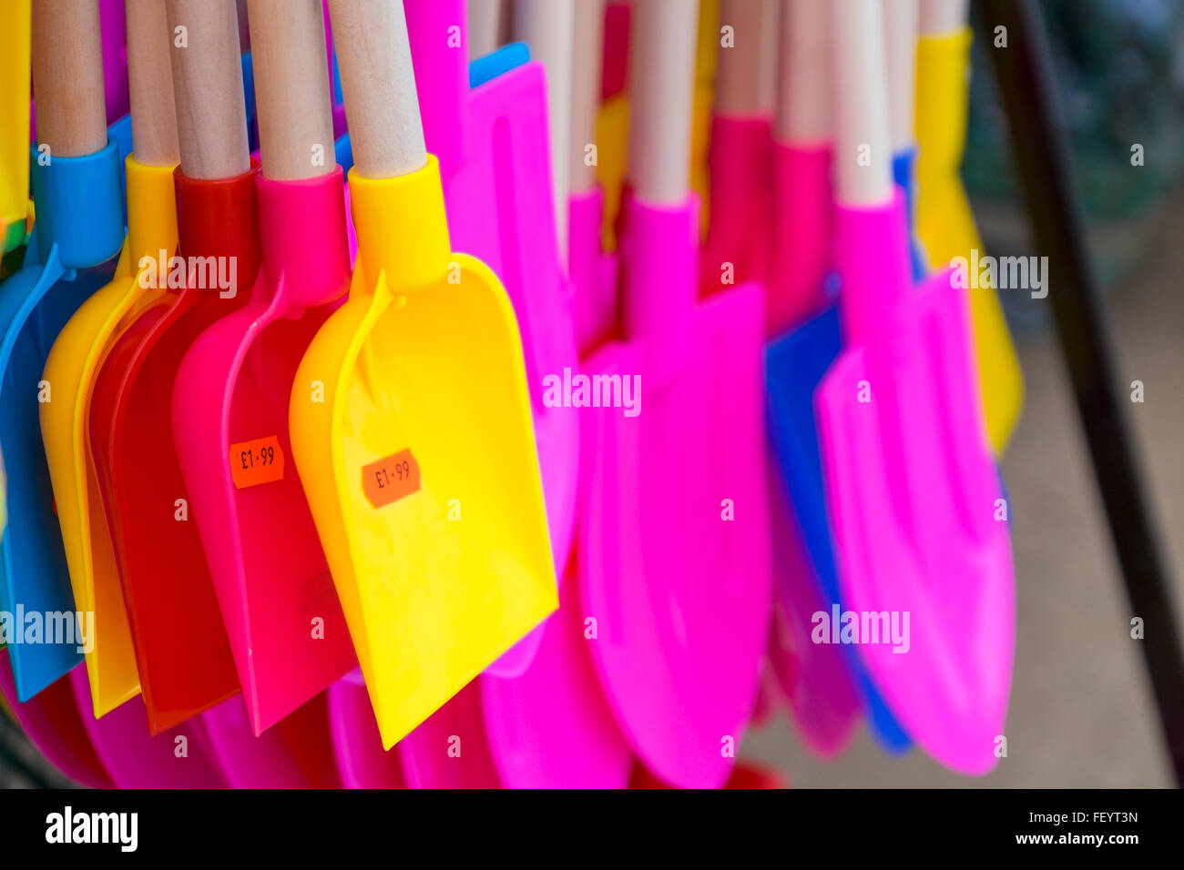 Display of buckets and spades at a seaside shop. Stock Photo
