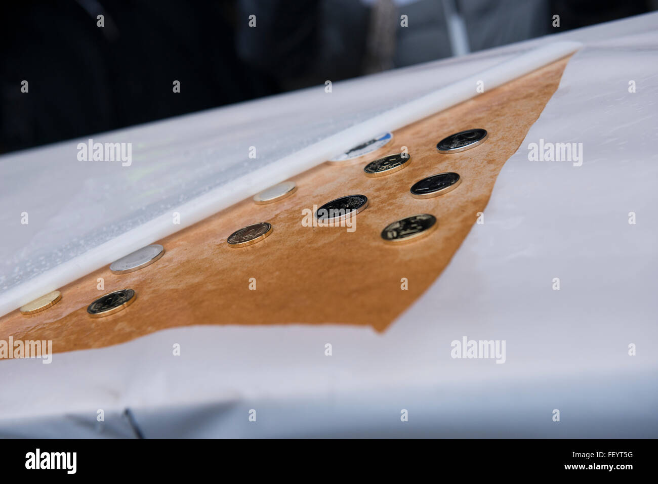 Turku, Finland. 9th February. Keel-laying of the new Tallink LNG-shuttle Megastar at the Meyer Turku Shipyard. The lucky coins are placed under the keel of the vessel. Credit:  Stefan Crämer/Alamy Live News Stock Photo