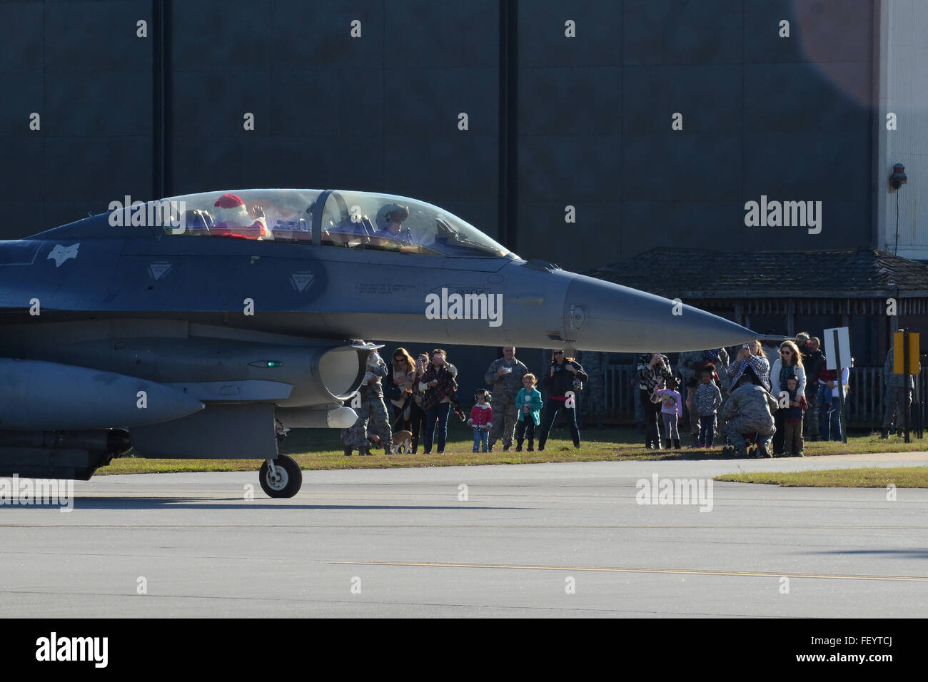 Swamp Fox Airmen and their families welcome the arrival of Santa Claus at McEntire Joint National Guard Base, S.C., Dec. 5, 2015.  Follow Santa as he travels the globe by visiting www.noradsanta.org. Stock Photo