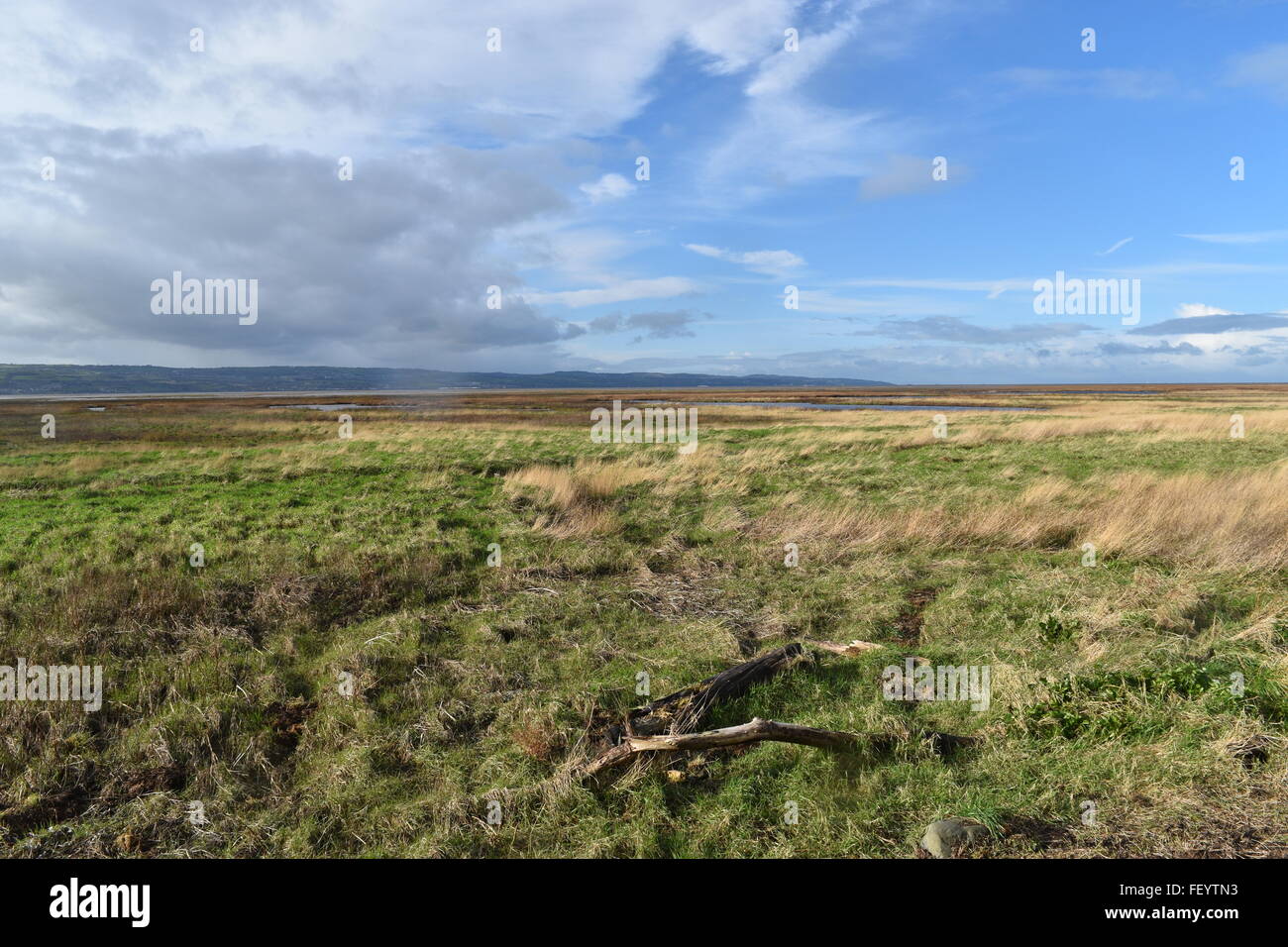 View from Parkgate on the Wirral Peninsular looking across the Dee Estuary towards North Wales. Stock Photo