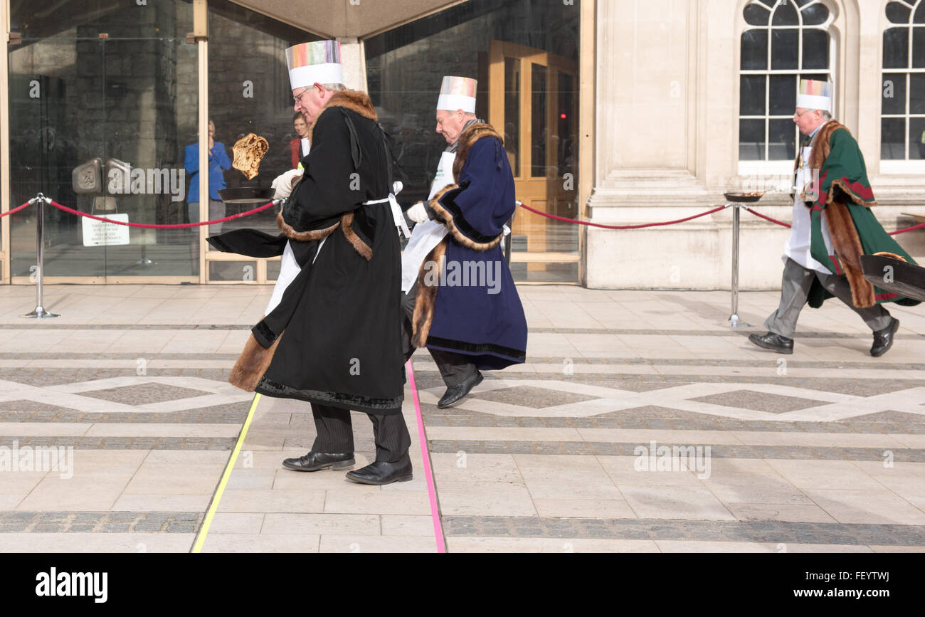 London, UK. 9th February, 2016. Masters of the City of London Livery companies take part in the annual pancake race Credit:  Ian Davidson/Alamy Live News Stock Photo