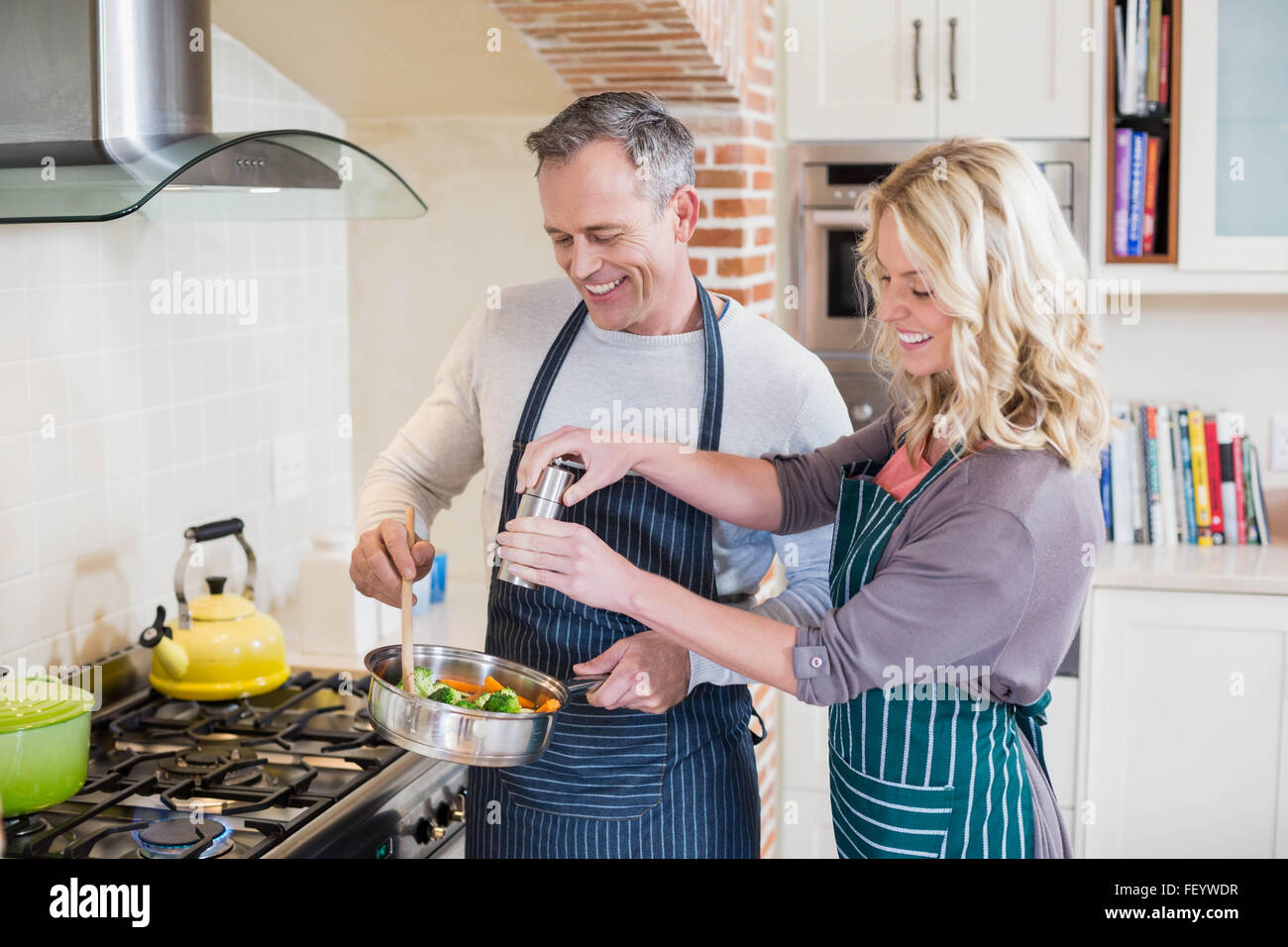Cute couple cooking Stock Photo