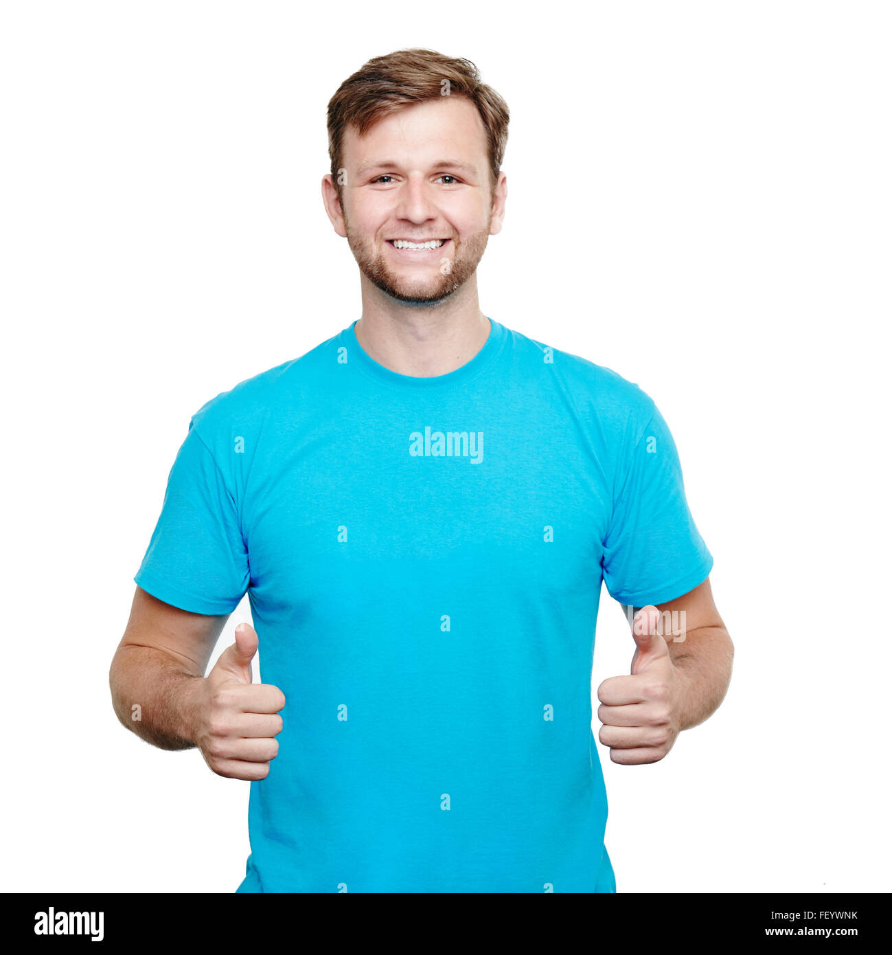 Smiling young man showing thumbs up Stock Photo