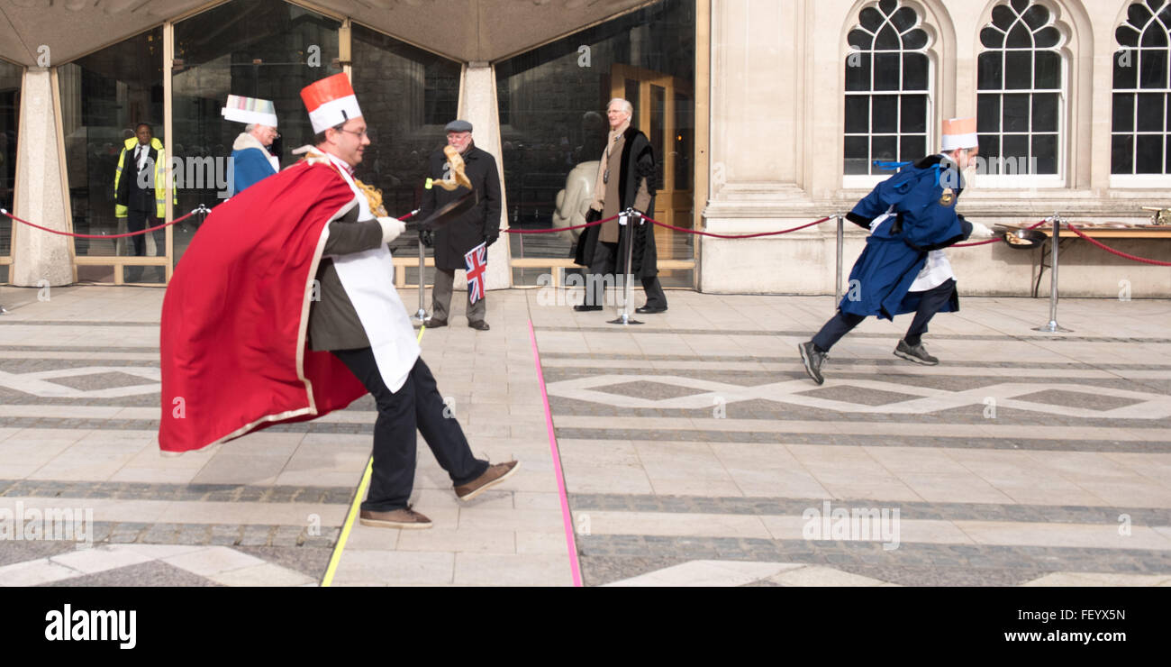 London, UK. 9th February, 2016. Masters of the City of London Livery companies take part in the annual pancake race Credit:  Ian Davidson/Alamy Live News Stock Photo
