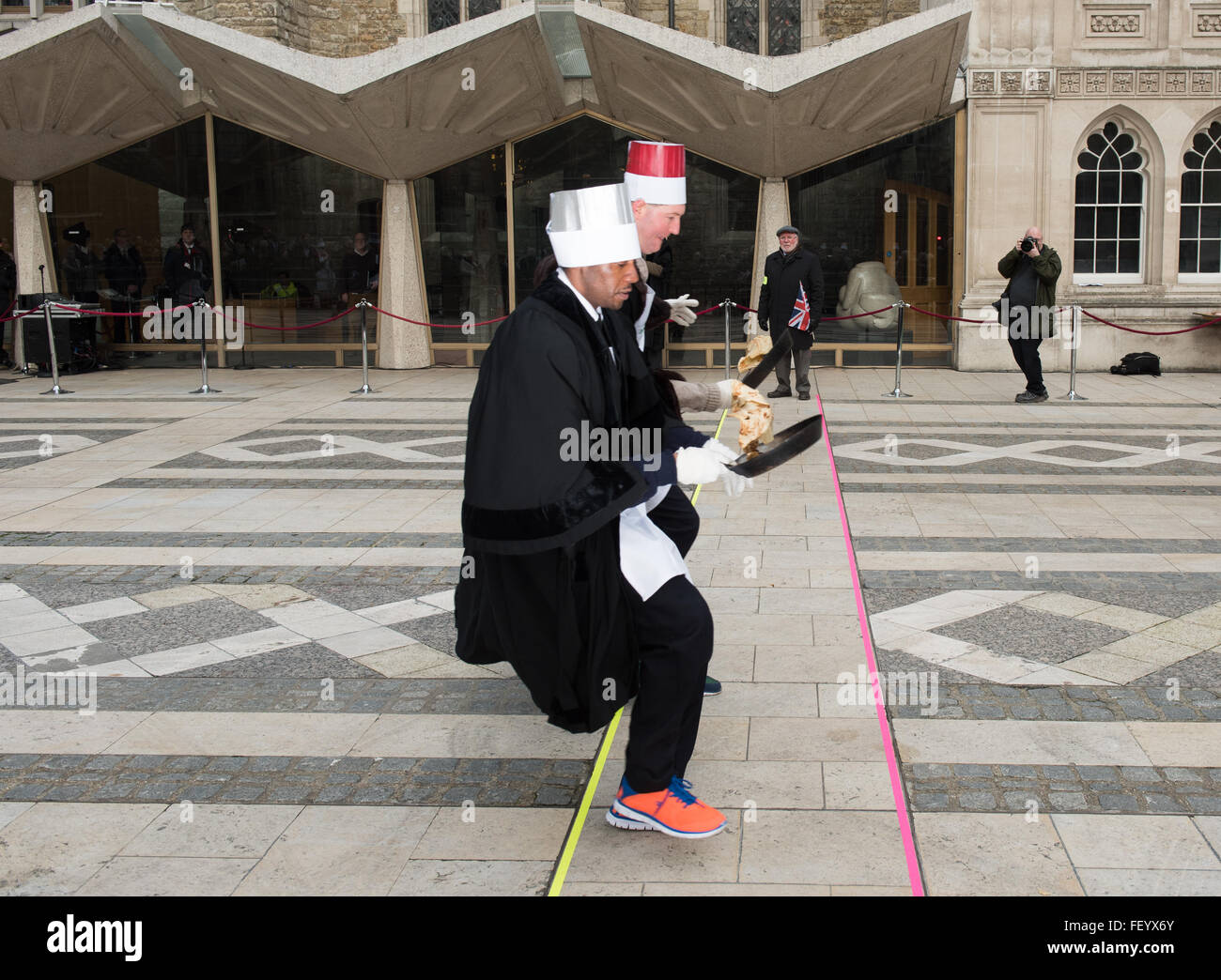 London, UK. 9th February, 2016. members of the City of London Livery companies take part in the annual pancake race Credit:  Ian Davidson/Alamy Live News Stock Photo