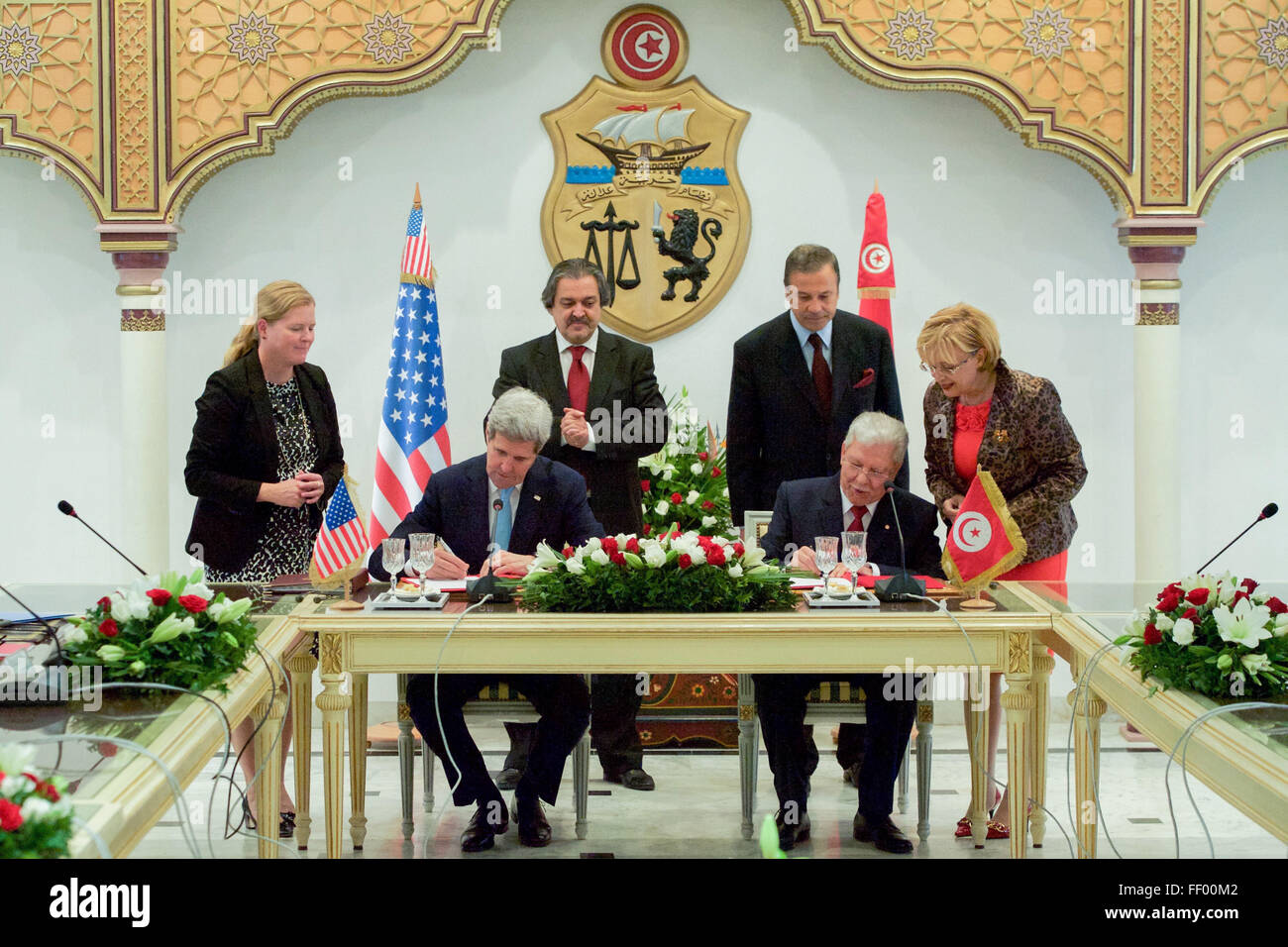 Secretary Kerry Signs Agreement with Foreign Minister Baccoucheo to Hold Loan Guarantee Negotiations at the Ministry of Foreign Affairs in Tunis Stock Photo