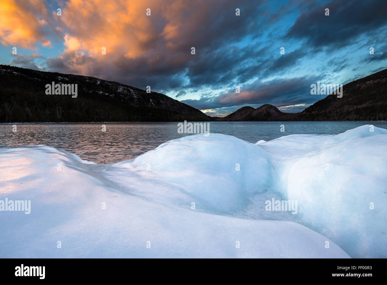 The Bubbles seen from the ice covered shore of Jordan Pond in winter in Acadia National Park, Mount Desert Island, Maine. Stock Photo