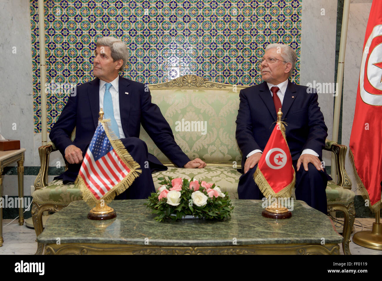 Secretary Kerry Sits with Foreign Minister Baccouche Before a Bilaterial Meeting at the Ministry of Foreign Affairs in Tunis Stock Photo