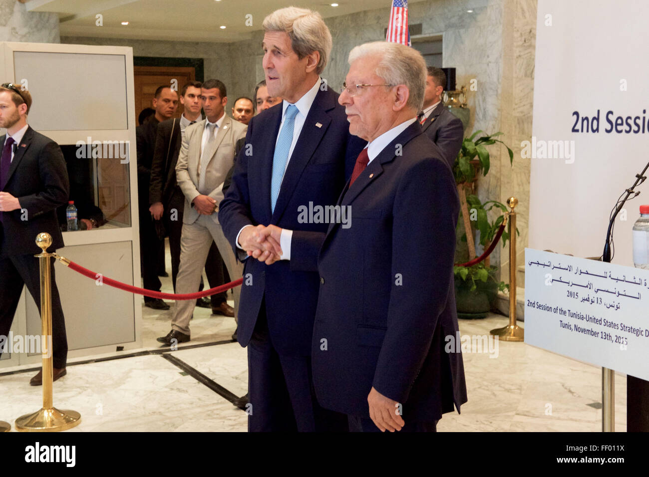 Secretary Kerry Shakes Hands with Foreign Minister Baccouche Before a News Conference at the Ministry of Foreign Affairs in Tunis Stock Photo