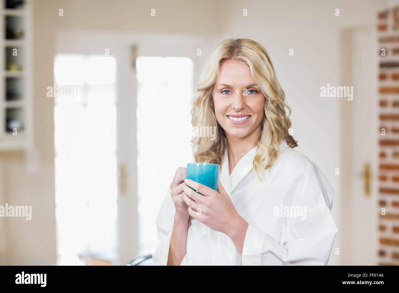 Pretty woman having a cup of coffee Stock Photo