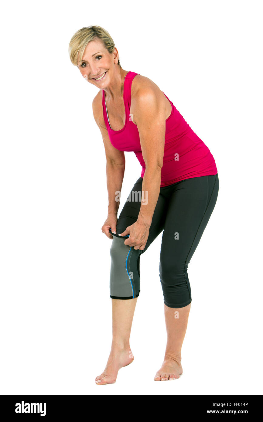middle age woman with patellar knee brace Stock Photo