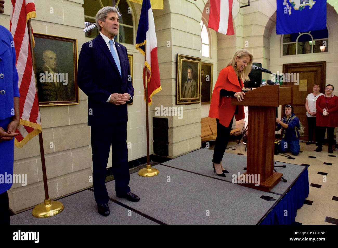 Secretary Kerry Listens as Ambassador Hartley Introduces Him to Members of U.S. Embassy France and the U.S. Missions to UNESCO and OECD in Paris Stock Photo