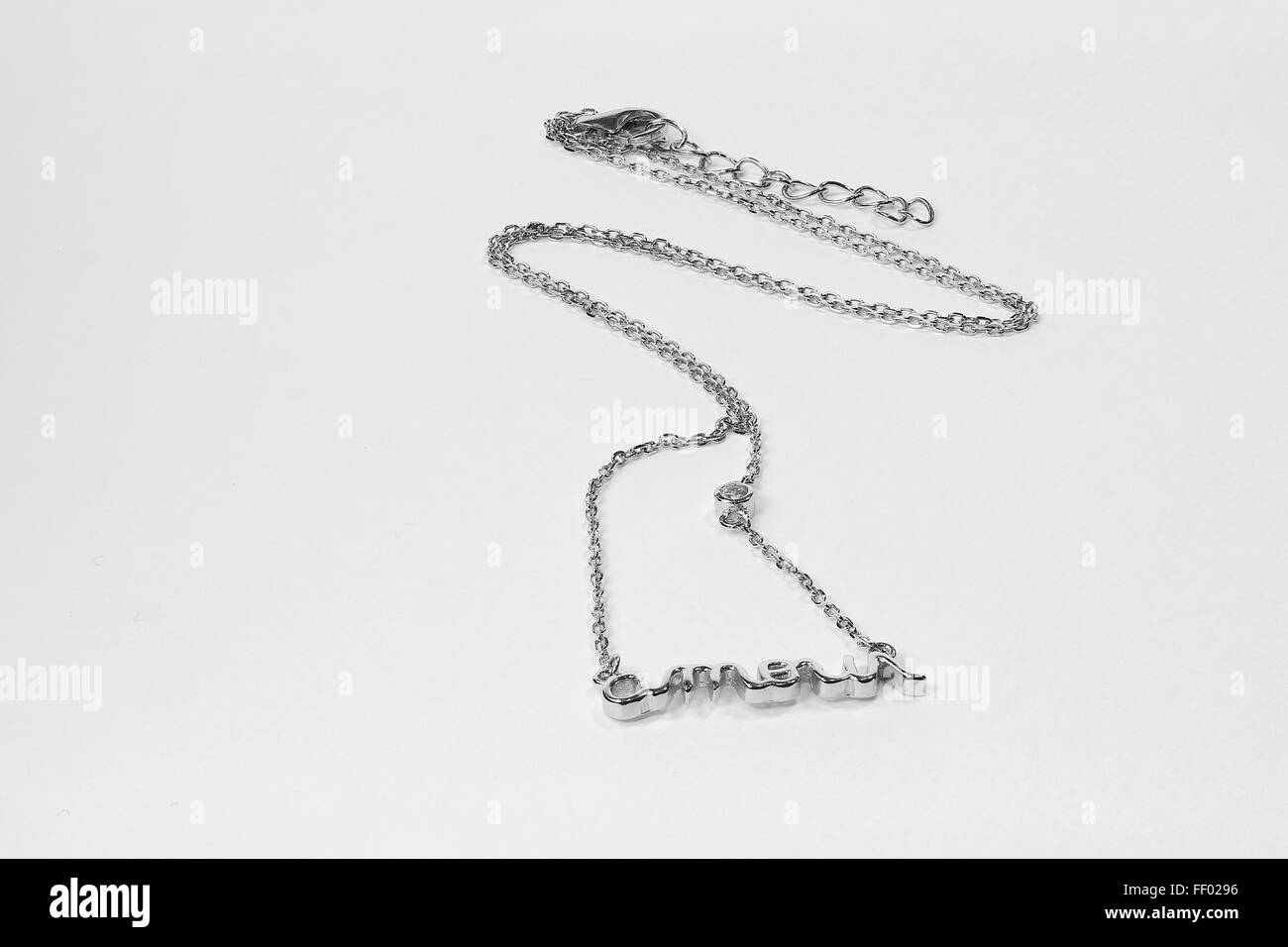 Silver necklace isolated on the white background Stock Photo - Alamy
