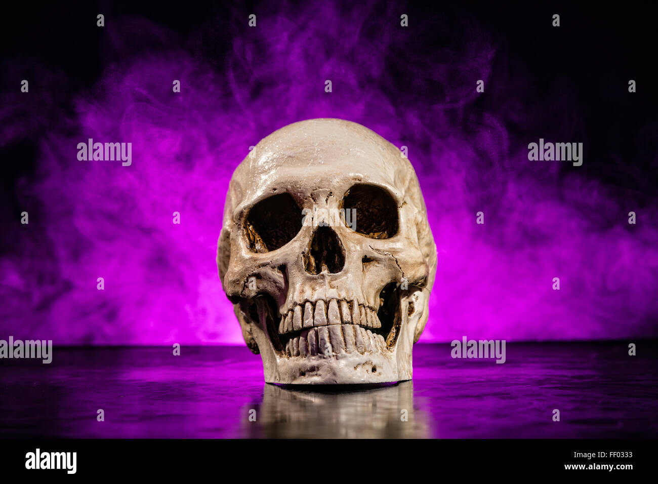 Human skull head with smoke Stock Photo