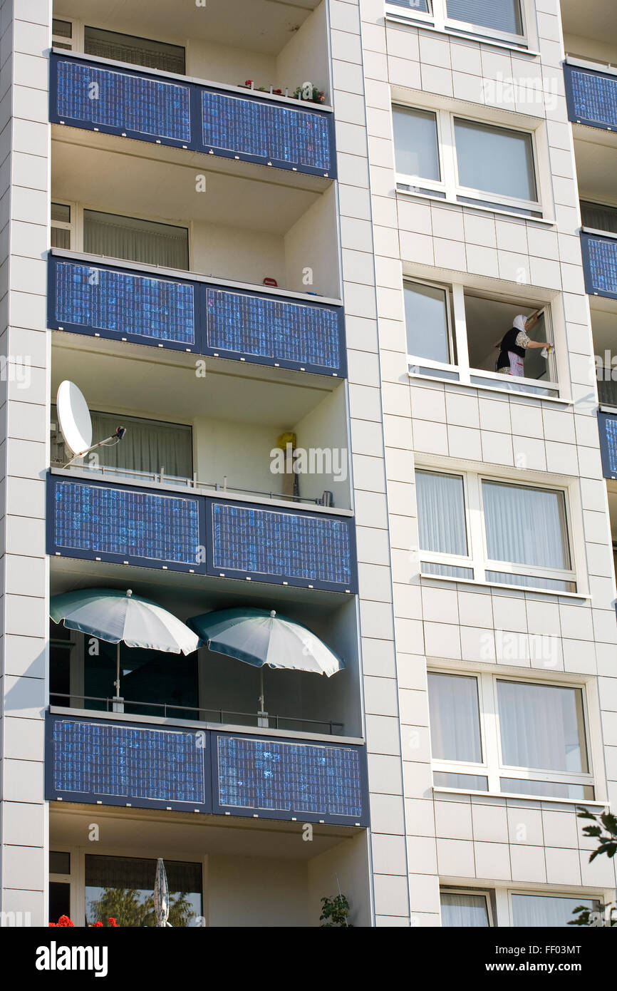 Europe, Germany, Cologne, solar energy housing estate in Cologne-Bocklemuend, photovoltaic array, solar modules at the balcony b Stock Photo
