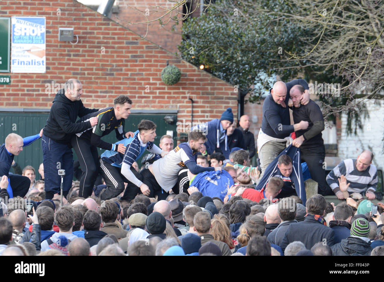 Ashbourne, Derbyshire, UK. 9th Feb, 2016. Players battle for the ball in the hug. Thousands join in the Shrovetide football derby. The goals are three miles apart and the game takes place over two eight hour periods Shrove Tuesday and Ash Wednesday. Credit:  Nigel Spooner/Alamy Live News Stock Photo