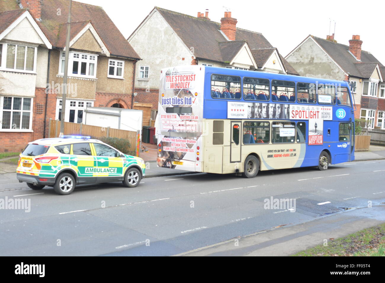 Woman suffers head injury in Tilehurst Road, Reading, Berkshire after bus collides with car. Charles Dye / Alamy Live News. Stock Photo