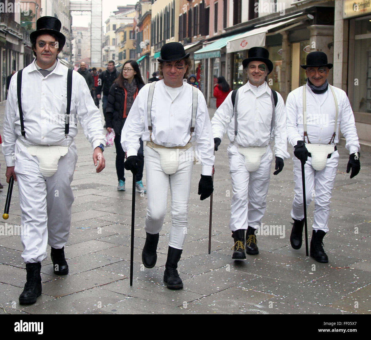 Venice, Italy. 09th Feb, 2016. A group of men dressed with carnival costumes as Arancia Meccanica (A Clockwork Orange) movie walking on the street during the Venice Carnival on the last day of Carnival . Credit:  Andrea Spinelli/Pacific Press/Alamy Live News Stock Photo