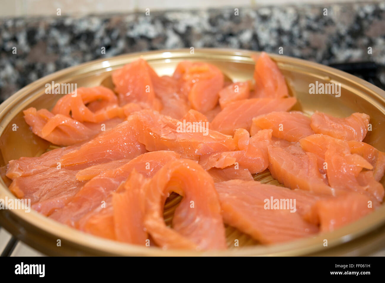slices of smoked Norwegian salmon for appetiser Stock Photo