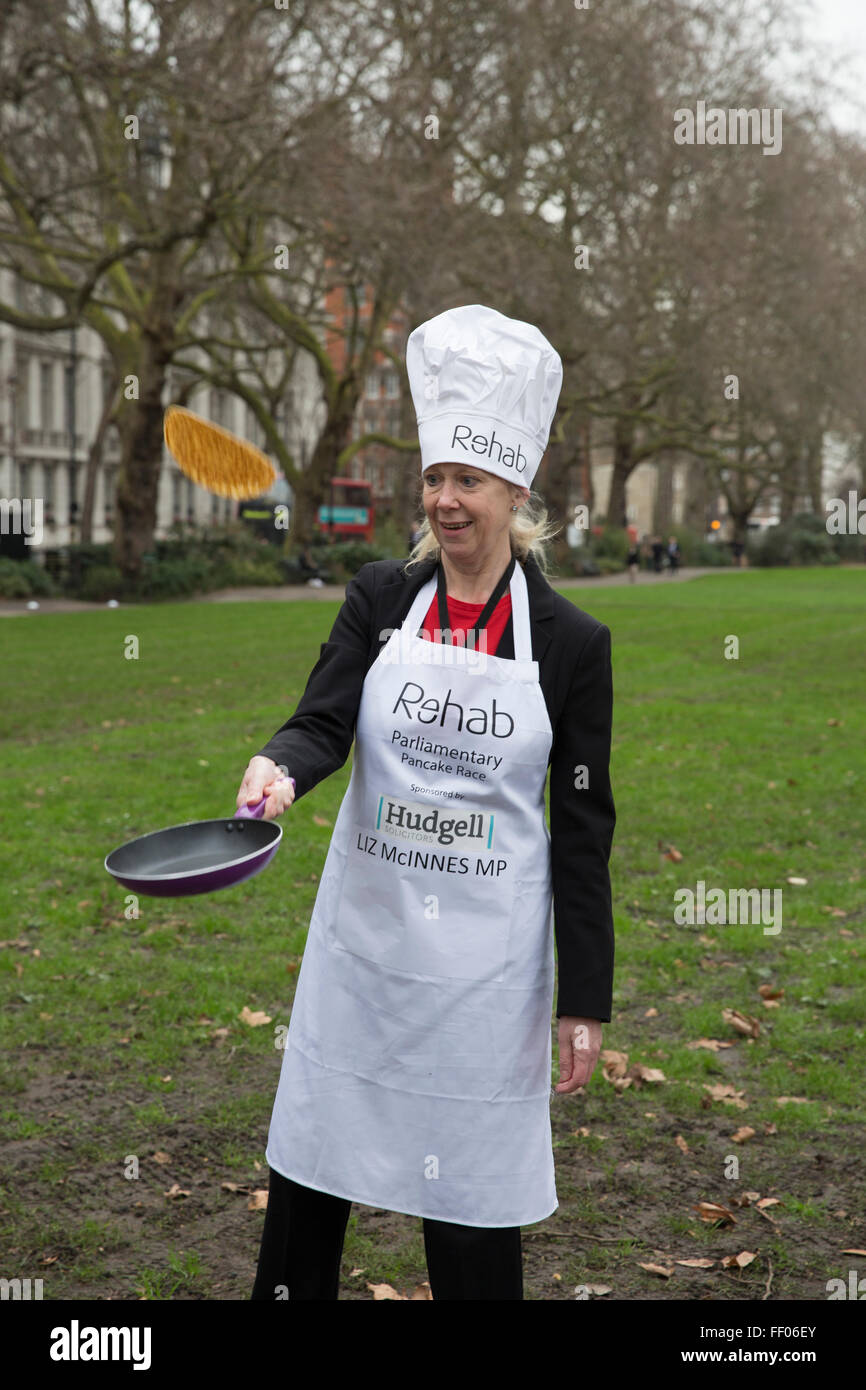 Westminster,UK,9th February 2016,Liz McKinnes MP tosses a pancake at the Rehab Parliamentary Pancake Race 201 Credit: Keith Larby/Alamy Live News Stock Photo