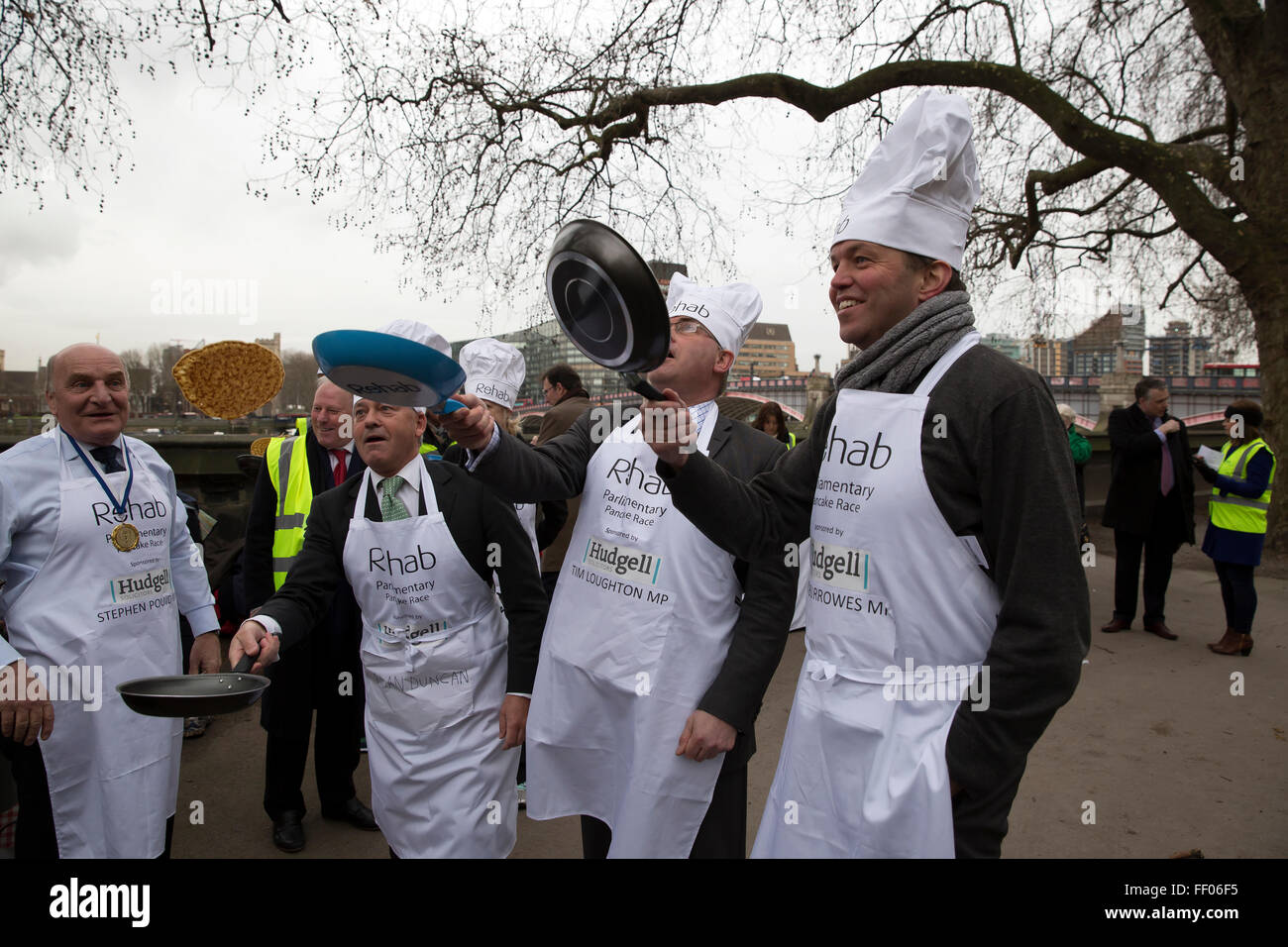 Westminster,UK,9th February 2016,Rehab Parliamentary Pancake Race 2016 takes place as runners representing the House of Commons, the House of Lords and the Parliamentary Press Gallery race against each other while tossing pancake Credit: Keith Larby/Alamy Live News Stock Photo