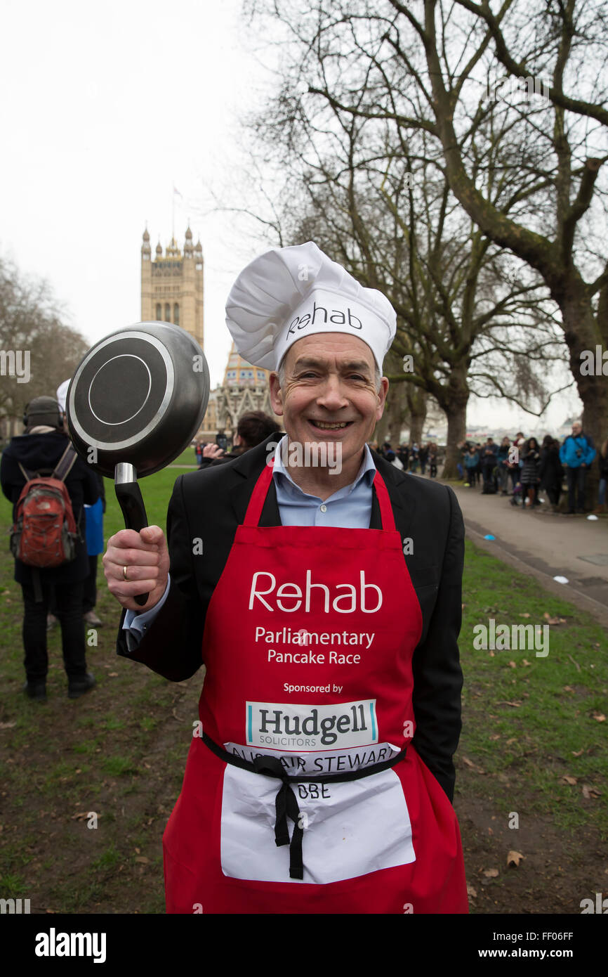 Westminster,UK,9th February 2016,Alastair Stewart OBE poses with a frying pan at the Rehab Parliamentary Pancake Race 201 Credit: Keith Larby/Alamy Live News Stock Photo