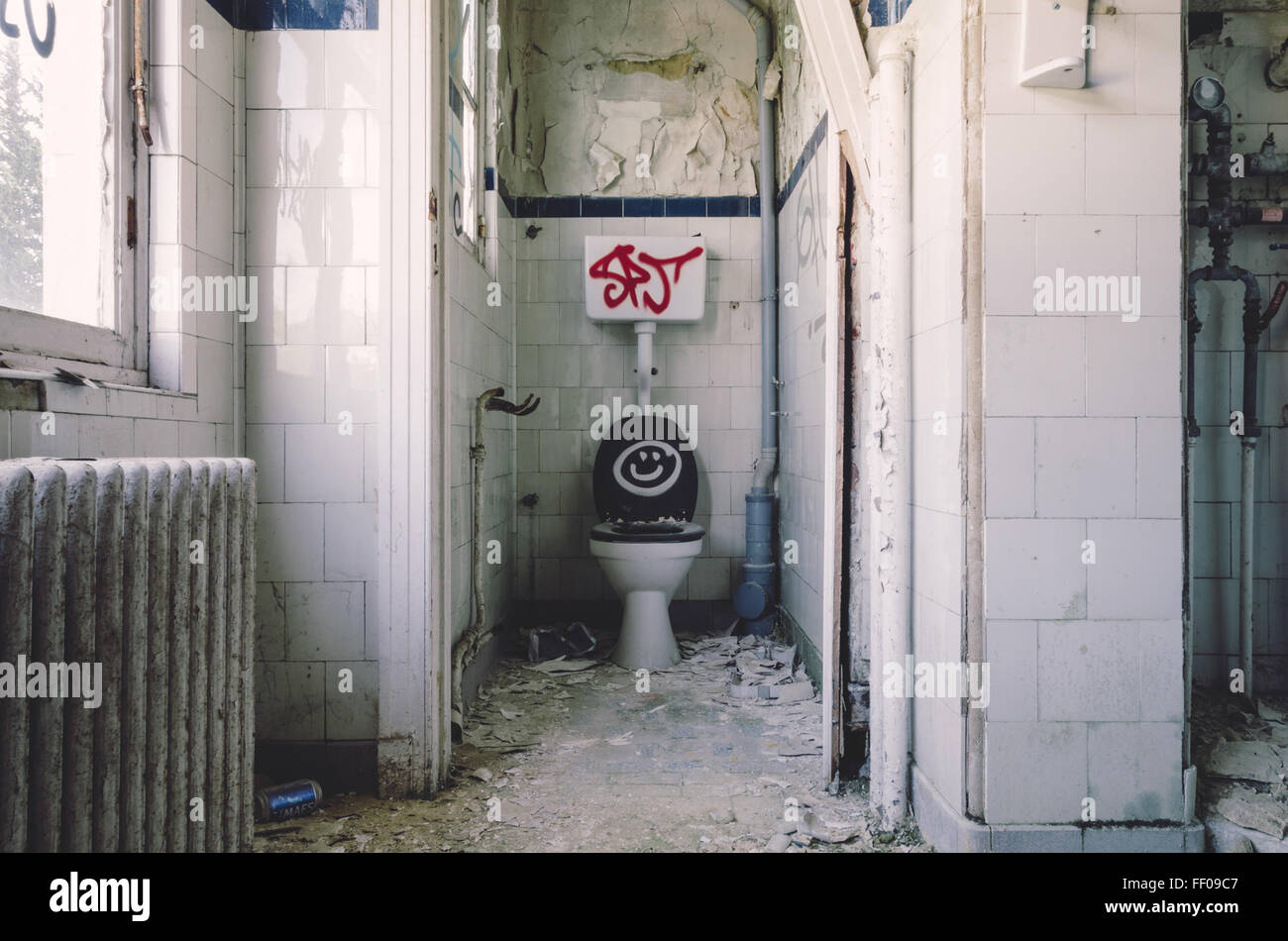Toilet in Dilapidated Building Toilet in Dilapidated Building Stock Photo
