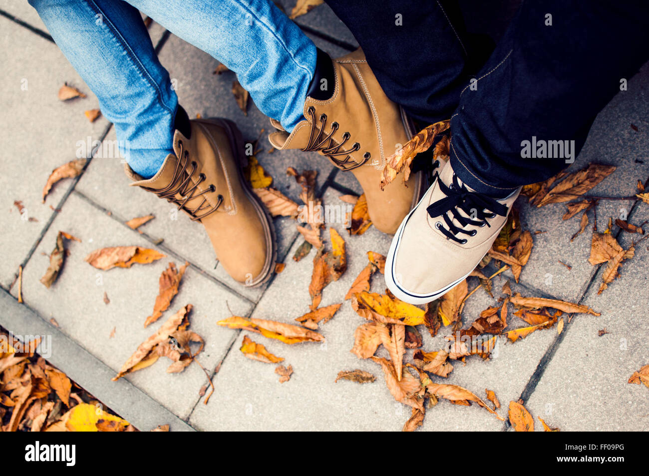 Two Pairs of Feet in Shoes Two Pairs of Feet in Shoe Stock Photo