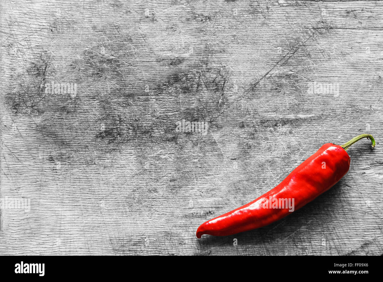 Red Hot Pepper On Old Gray Wooden Table Surface Texture Background Stock Photo