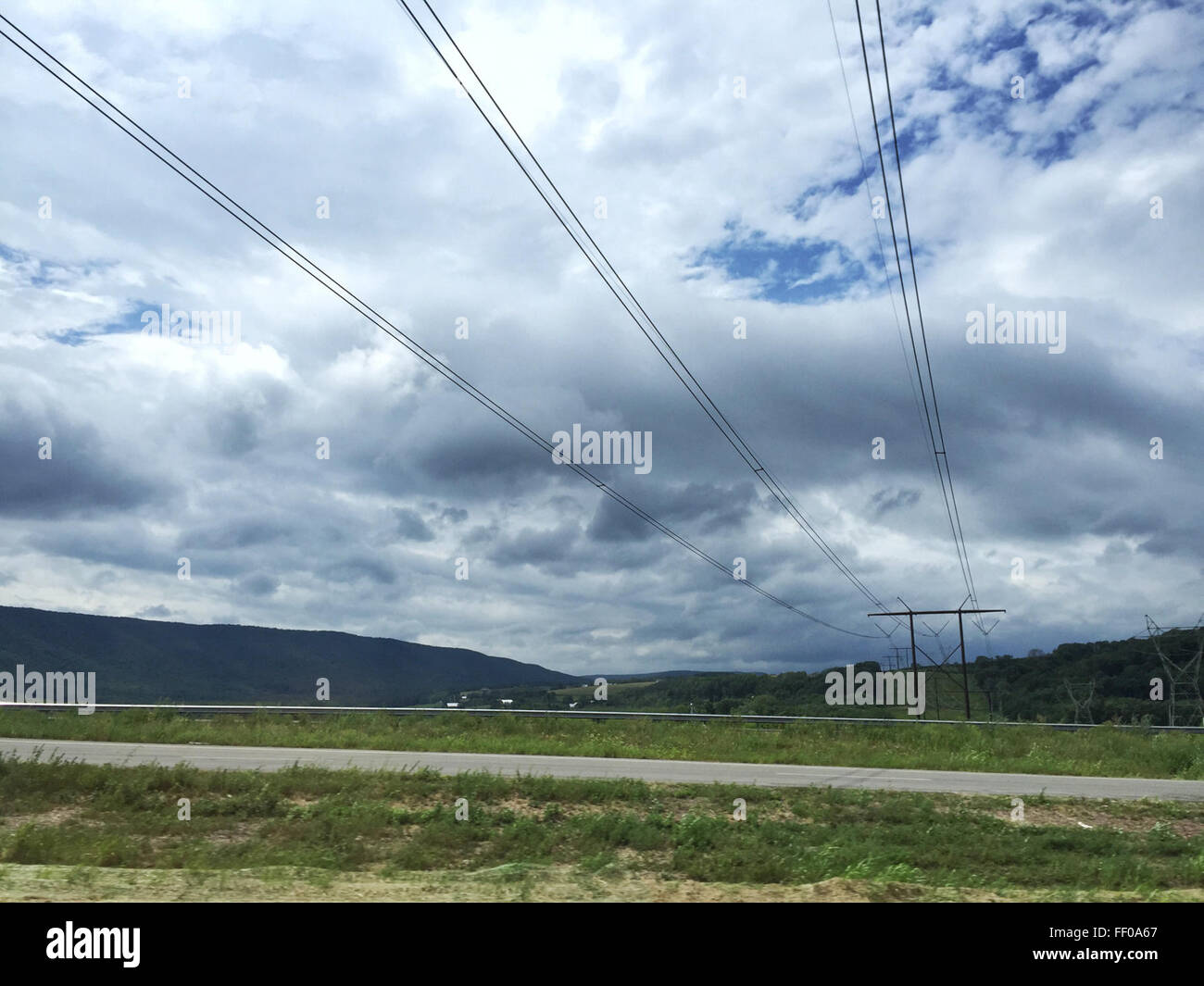 Overhead Power Lines on Country Landscape Overhead Power Lines on Country Landscape Stock Photo