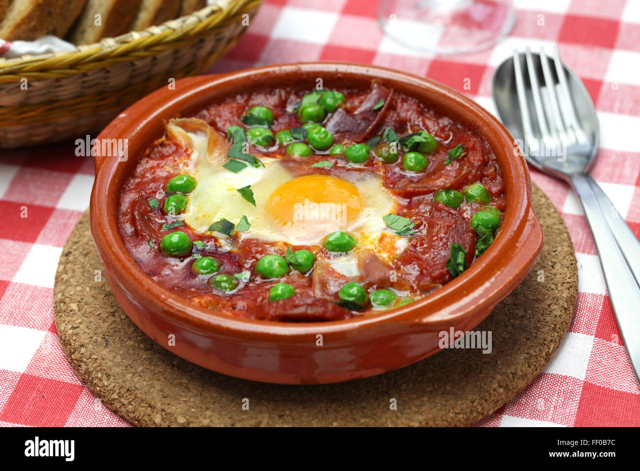 flamenco eggs, huevos a la flamenca, spanish andalusian cuisine Stock ...