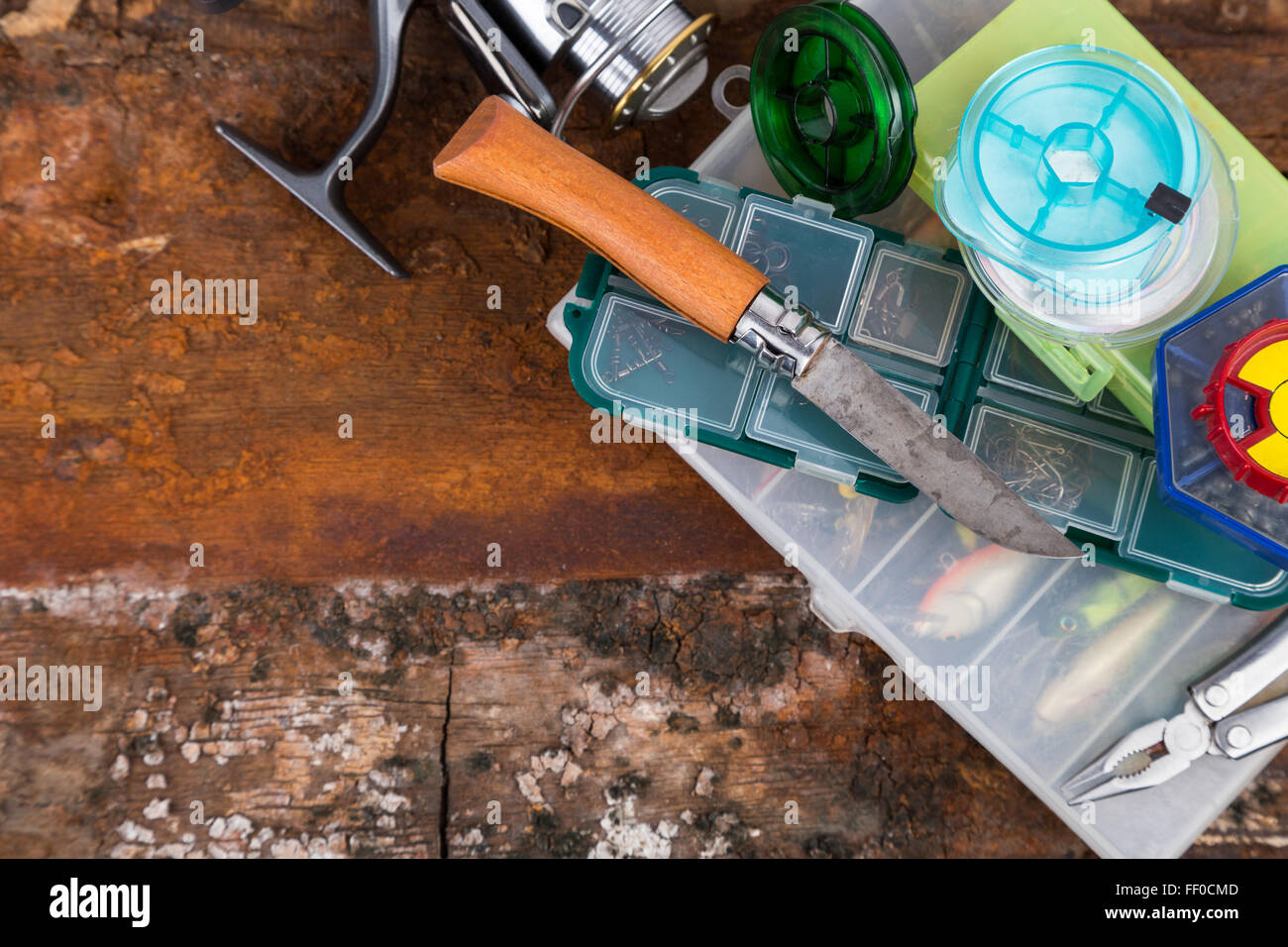 fishing tackles and baits in storage boxes Stock Photo