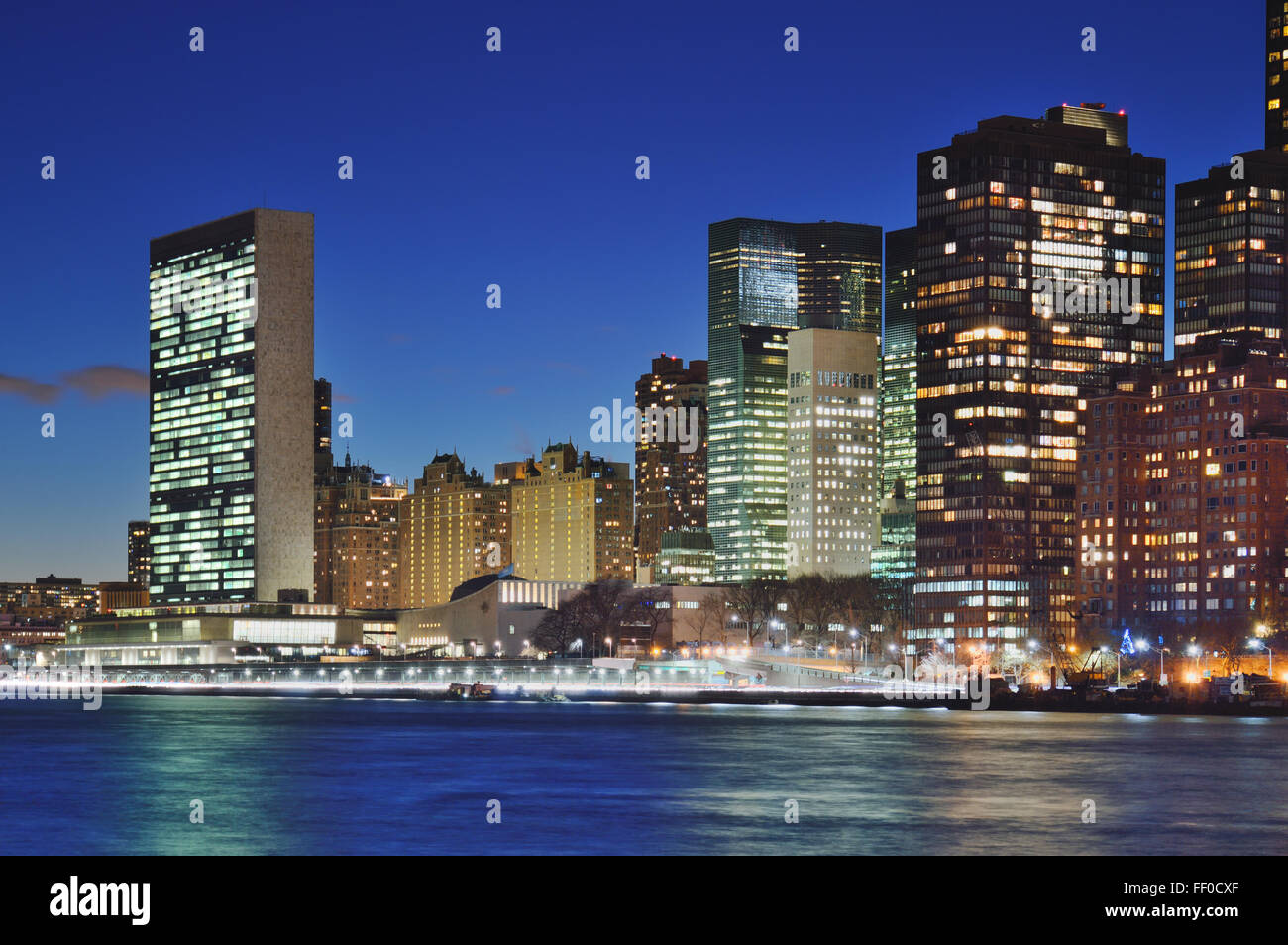 A night view of the New York City skyline from Roosevelt Island. Stock Photo
