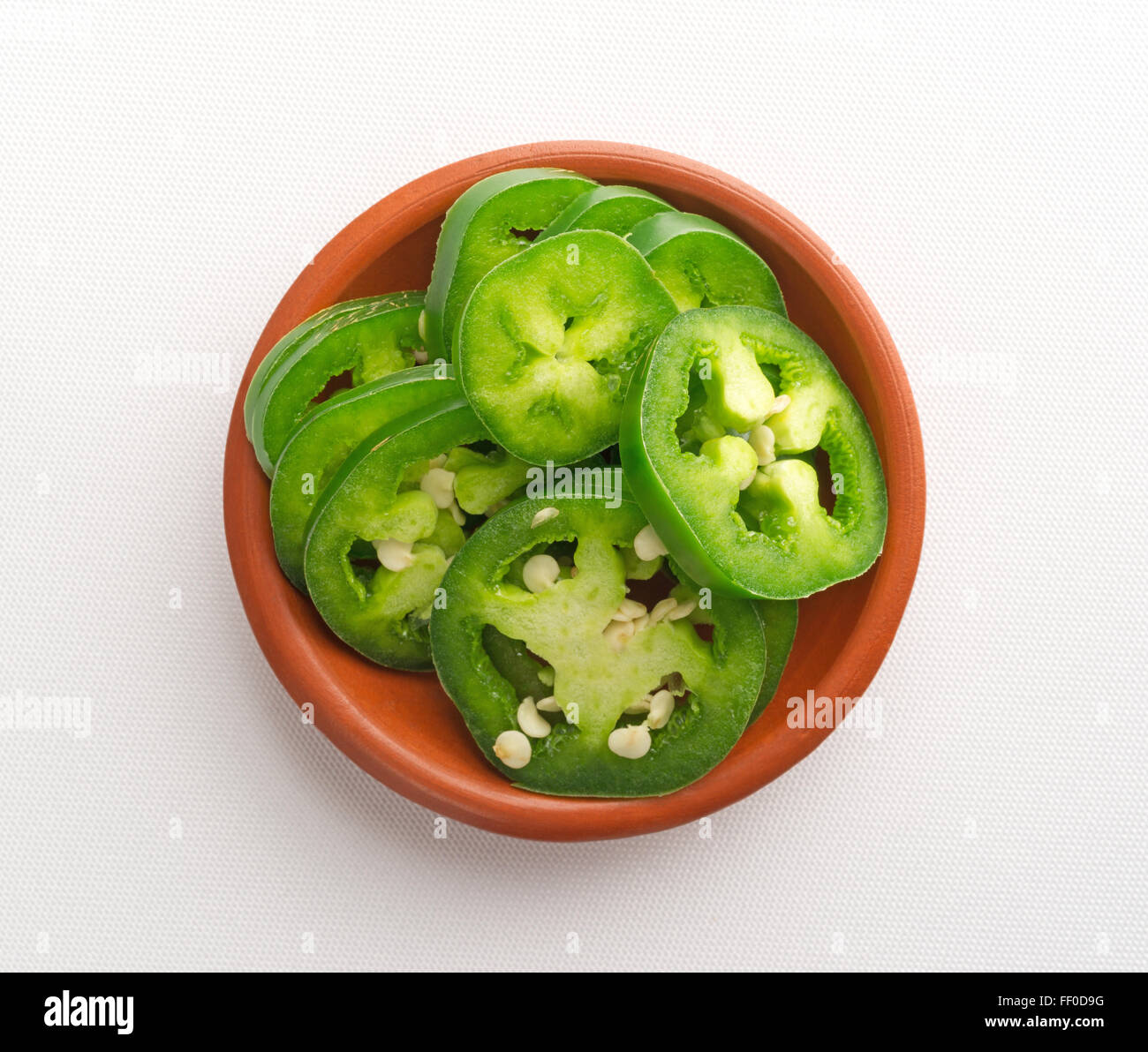 Green peppers sliced on white hi-res stock photography and images - Alamy