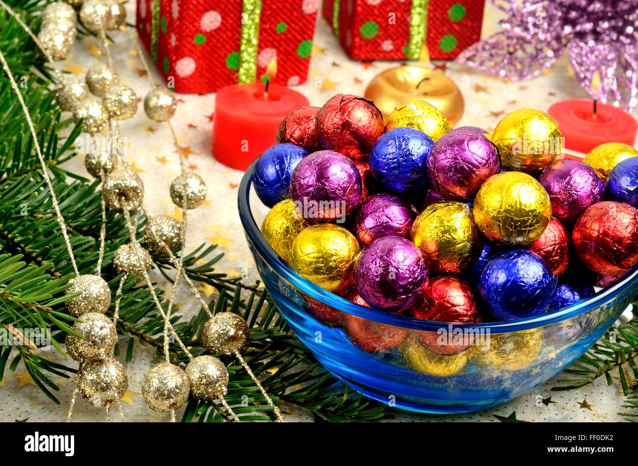 Christmas decoration and bowl with colorful tinfoil Stock Photo