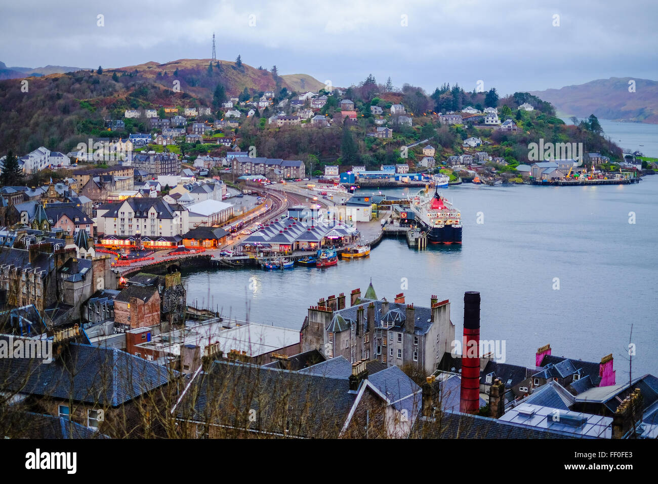 A lovely color colour photo taken from McCaig's Tower overlooking Oban Ferry Terminal at dawn. Stock Photo