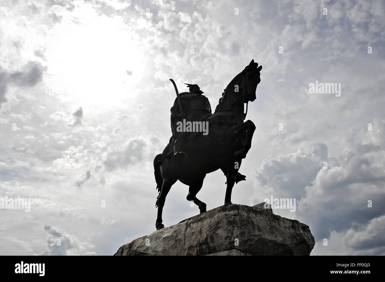 Statue of albanian national hero Skanderbeg, alsi known as George Castriot, is seen during daytime in Skanderbeg square Stock Photo
