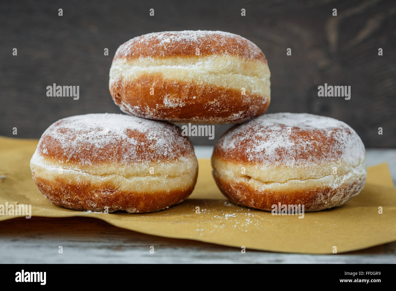 German doughnut filled with jam (Berliner /krapfen) Stock Photo