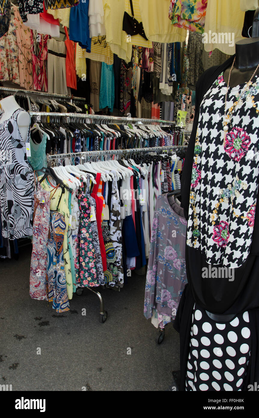 Sales of clothes in a street market Stock Photo