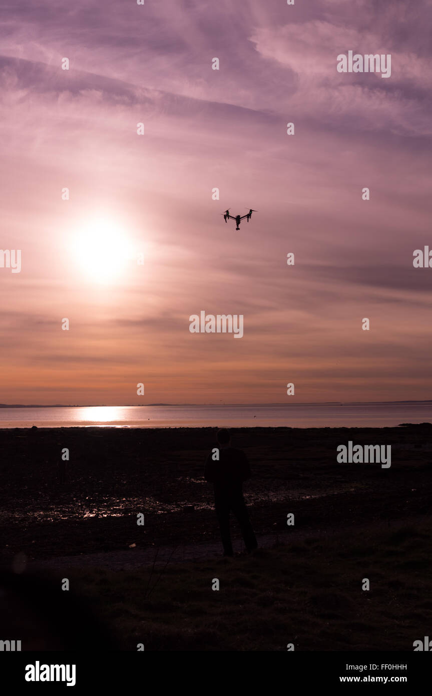 Drone in the sunset Stock Photo - Alamy