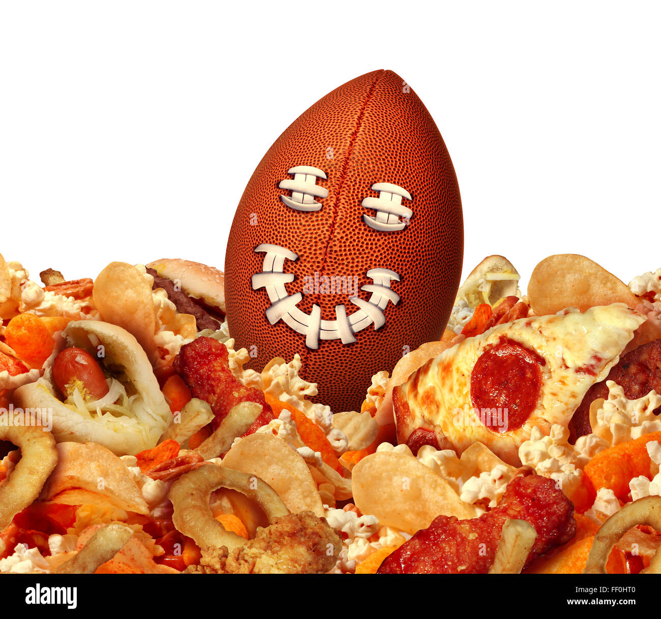 Football game party snack time and tailgating food concept as a ball with a smiling face sitting in a group of game day snacks as chips chicken wings for a celebration on tv watching of the championship match. Stock Photo