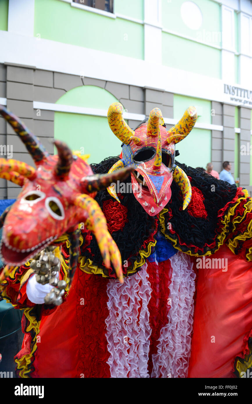 Traditional masked cultural figure VEJIGANTE during the carnival in Ponce. Puerto Rico. US territory. February 2016 Stock Photo