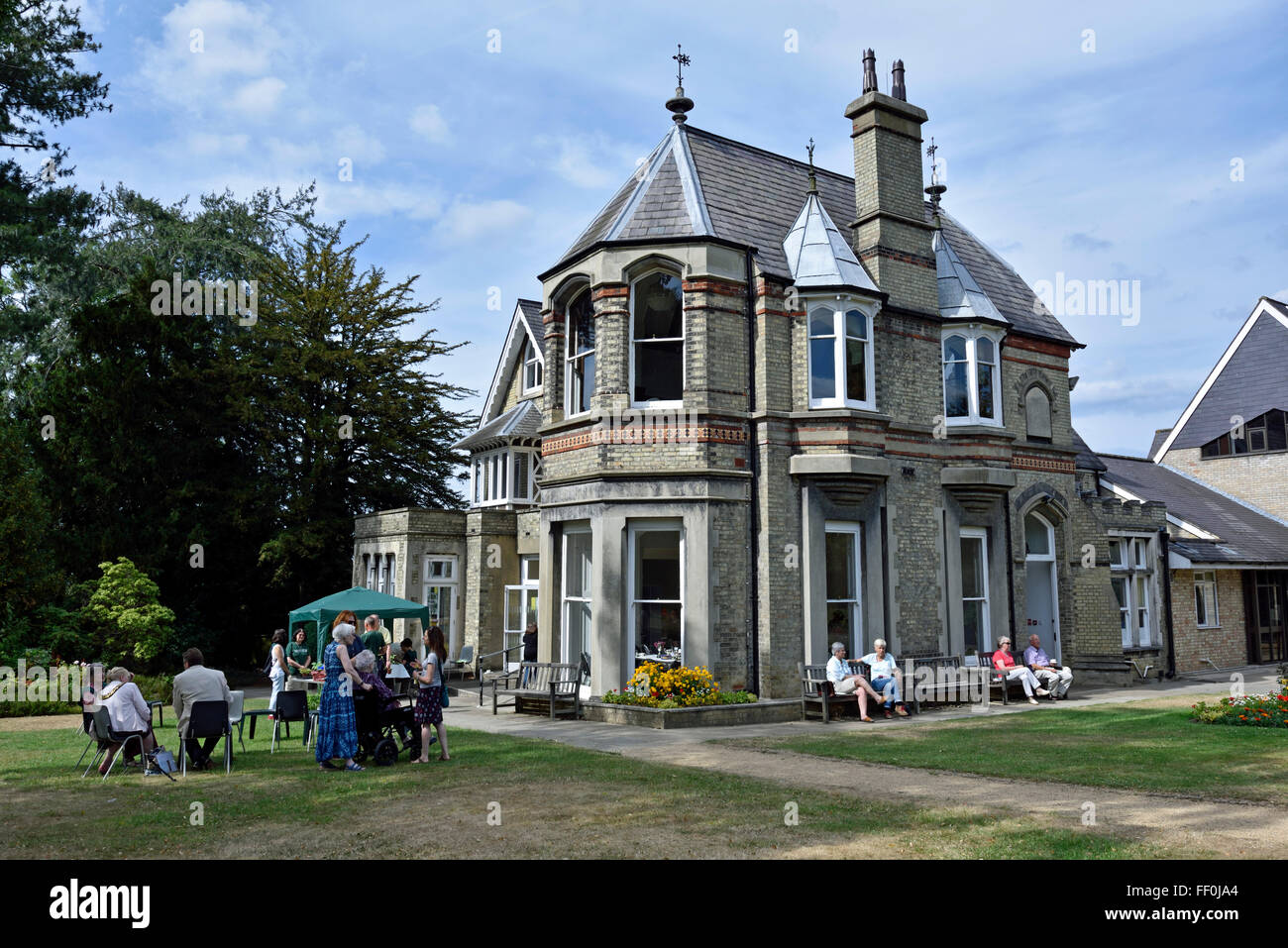 North Bank House a Victorian Villa with people in garden Muswell Hill London Borough of Haringey England Britain UK Stock Photo